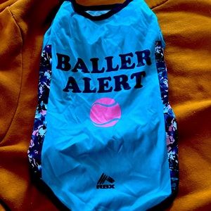 T shirts. Two sizes, one medium & one large. Fits more like small & medium.